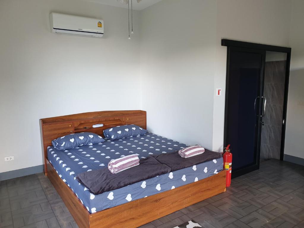 Postel nebo postele na pokoji v ubytování DOI TUNG Anisa Homestay