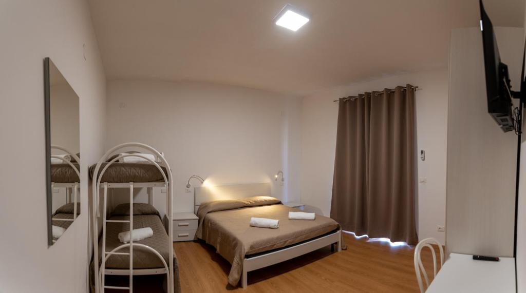 Letto o letti in una camera di Prestige house