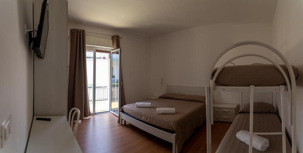 Letto o letti in una camera di Prestige house