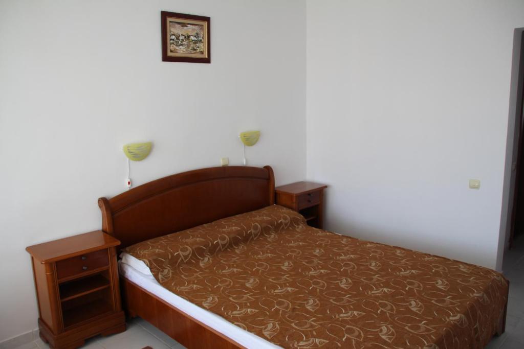 Postel nebo postele na pokoji v ubytování Hotel Orfeu