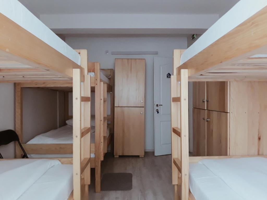 Postel nebo postele na pokoji v ubytování Bloom Inn