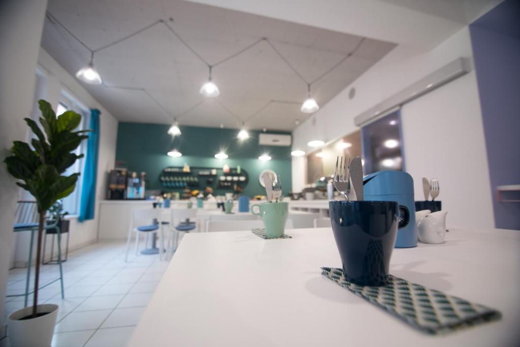 Reštaurácia alebo iné gastronomické zariadenie v ubytovaní Hotel Civitas