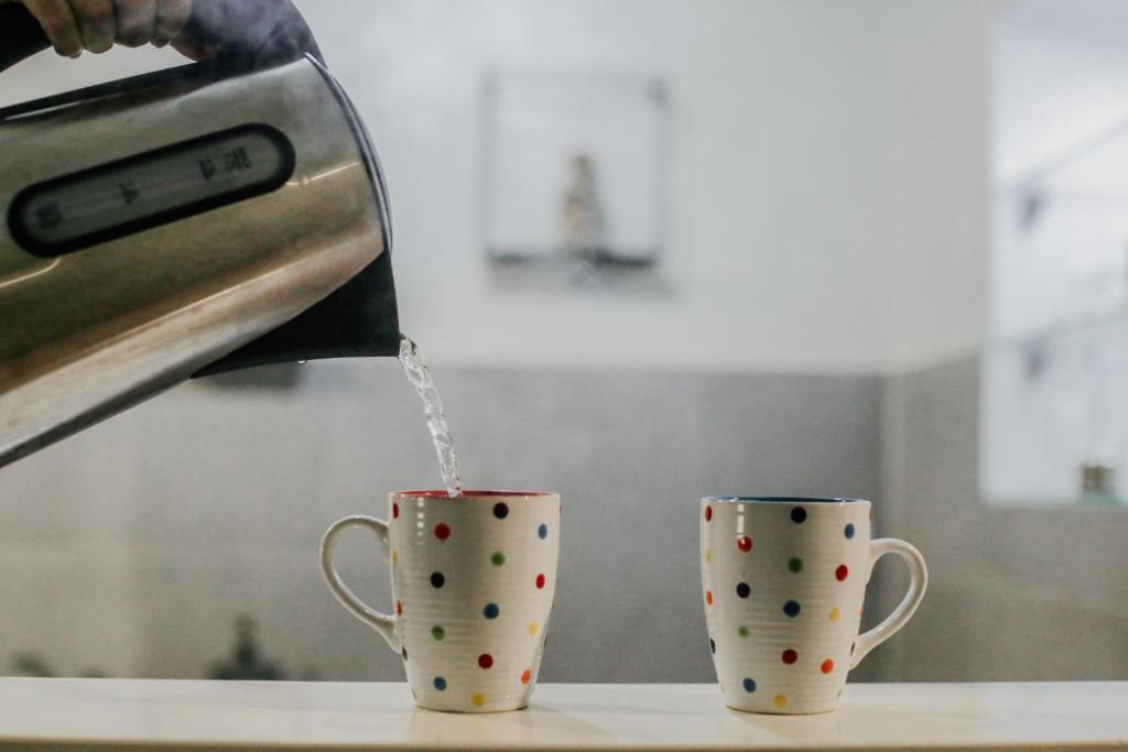 Příslušenství pro přípravu čaje a kávy v ubytování Hotel Fontana