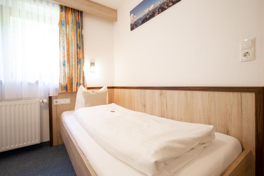 Posteľ alebo postele v izbe v ubytovaní Appartements Waldesrand