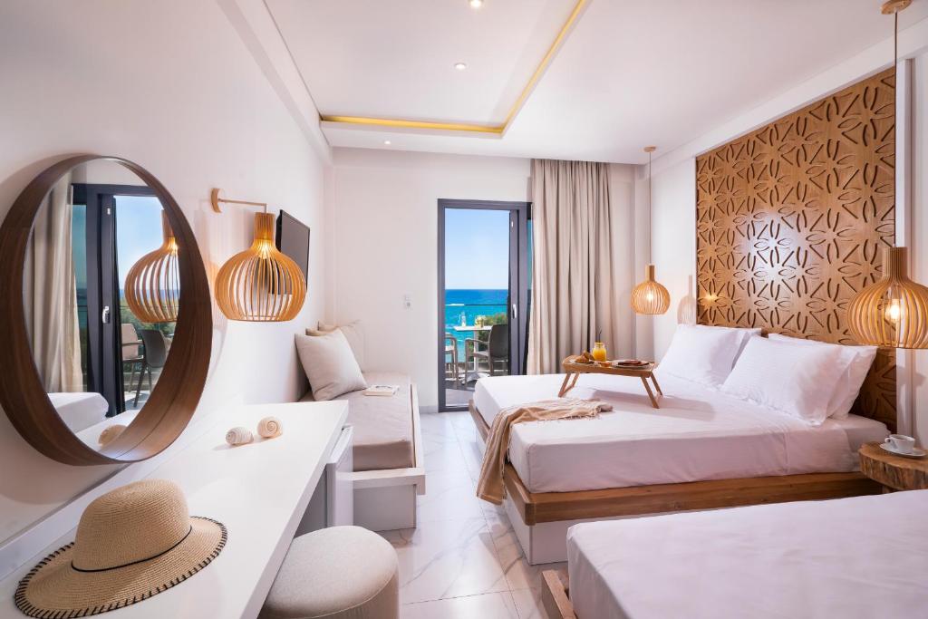 Postel nebo postele na pokoji v ubytování Acron Suites