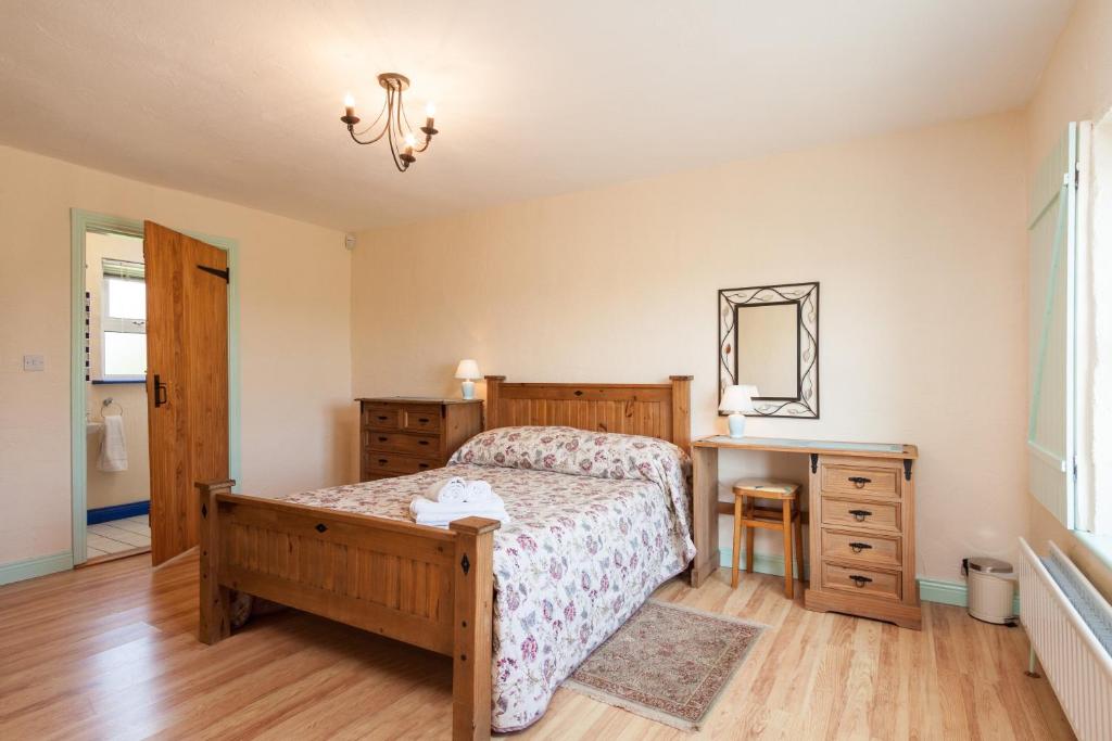 Postel nebo postele na pokoji v ubytování Kilmore Cottages Self - Catering
