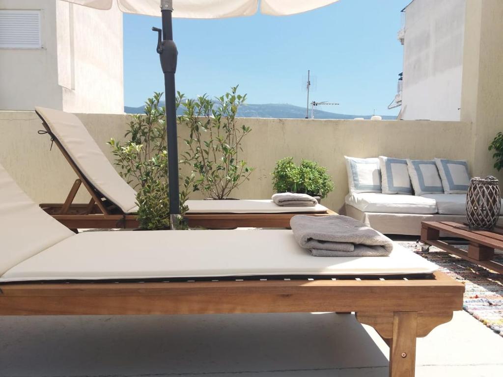 Posezení v ubytování INSPIRATION Guestroom with Amazing Roof Garden