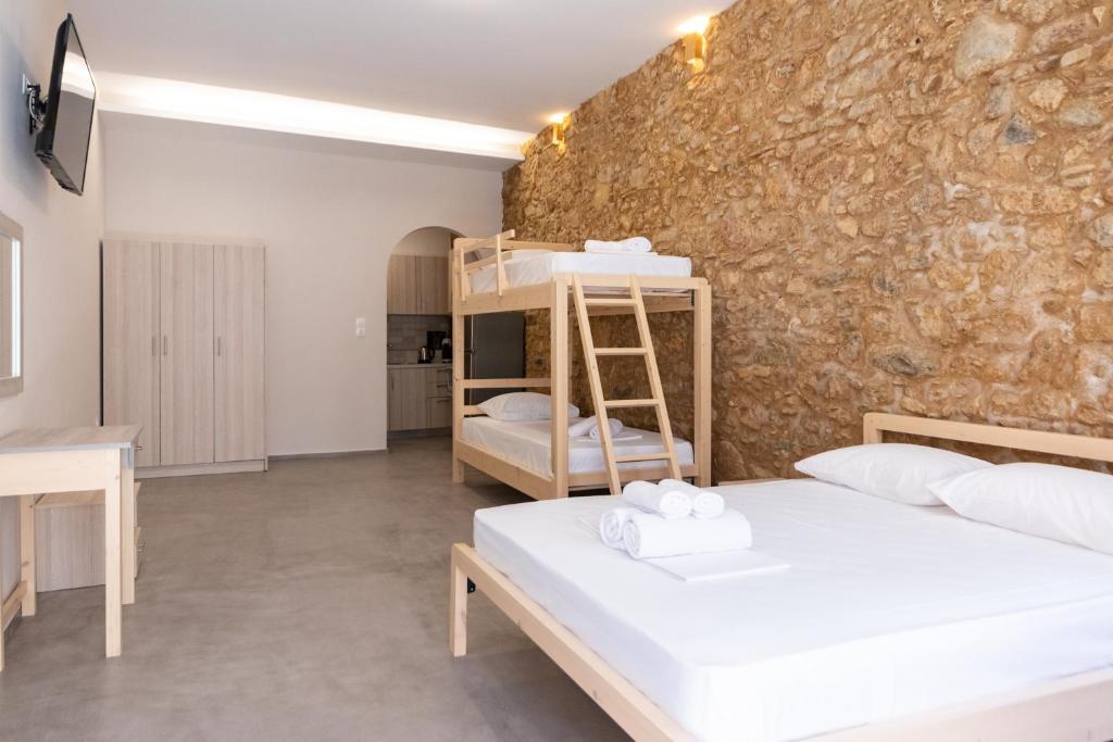 Postel nebo postele na pokoji v ubytování MARKOS LUXURY APARTMENTS