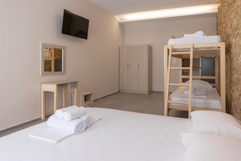 Postel nebo postele na pokoji v ubytování MARKOS LUXURY APARTMENTS