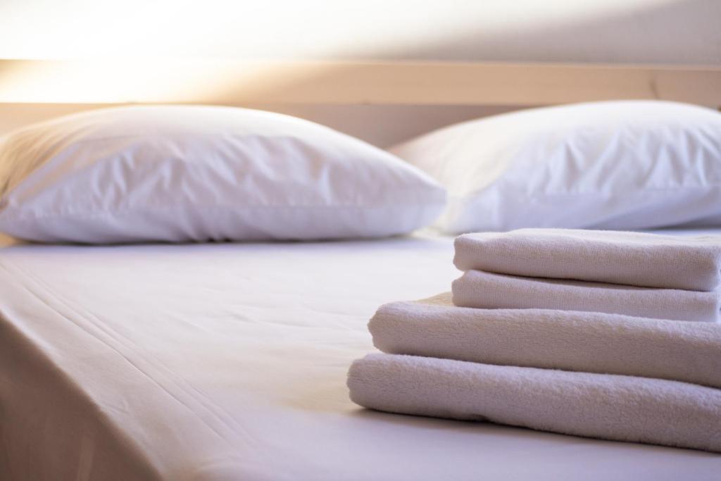 Postel nebo postele na pokoji v ubytování MARKOS LUXURY APARTMENTS