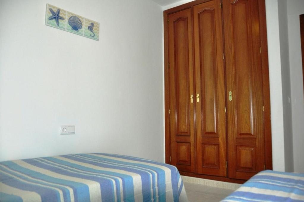 Postel nebo postele na pokoji v ubytování Casa el mar