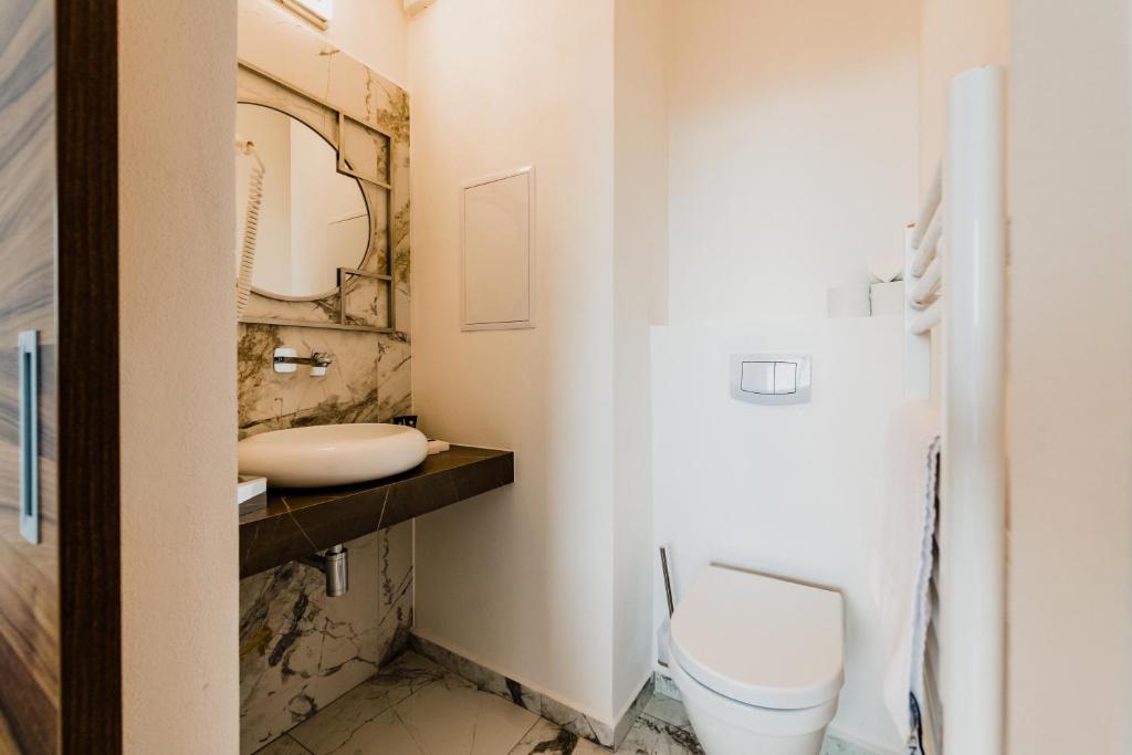 Koupelna v ubytování Hotel Palcát