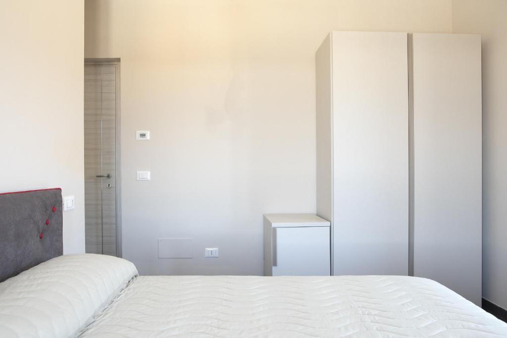 Postel nebo postele na pokoji v ubytování Residenza Cappelli - Affittacamere
