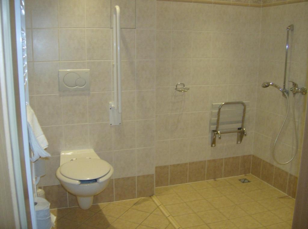 Koupelna v ubytování Hotel Maria