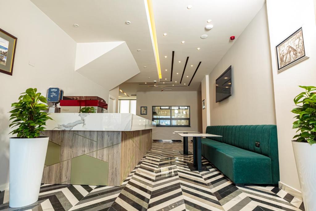 Kuchyň nebo kuchyňský kout v ubytování Real Hotel