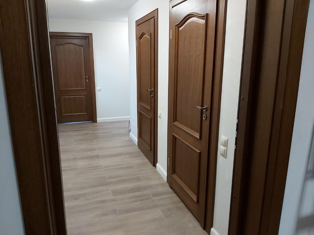 Fotografia z galérie ubytovania Leśny Dworek - Apartamenty SUPER z TV i salonem kominkowym v destinácii Mrągowo