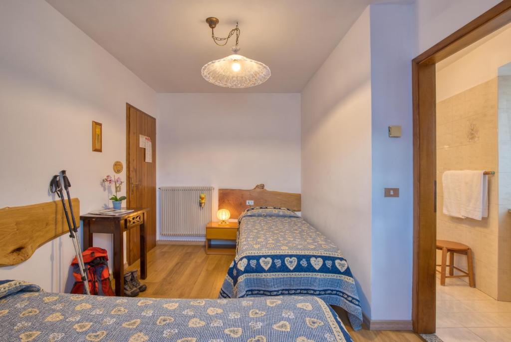 Postel nebo postele na pokoji v ubytování Albergo Moleta
