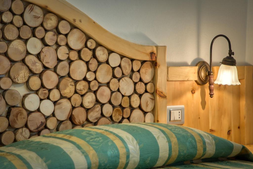 Postel nebo postele na pokoji v ubytování Albergo Moleta