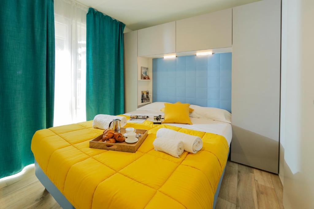 Postel nebo postele na pokoji v ubytování hu Park Albatros village