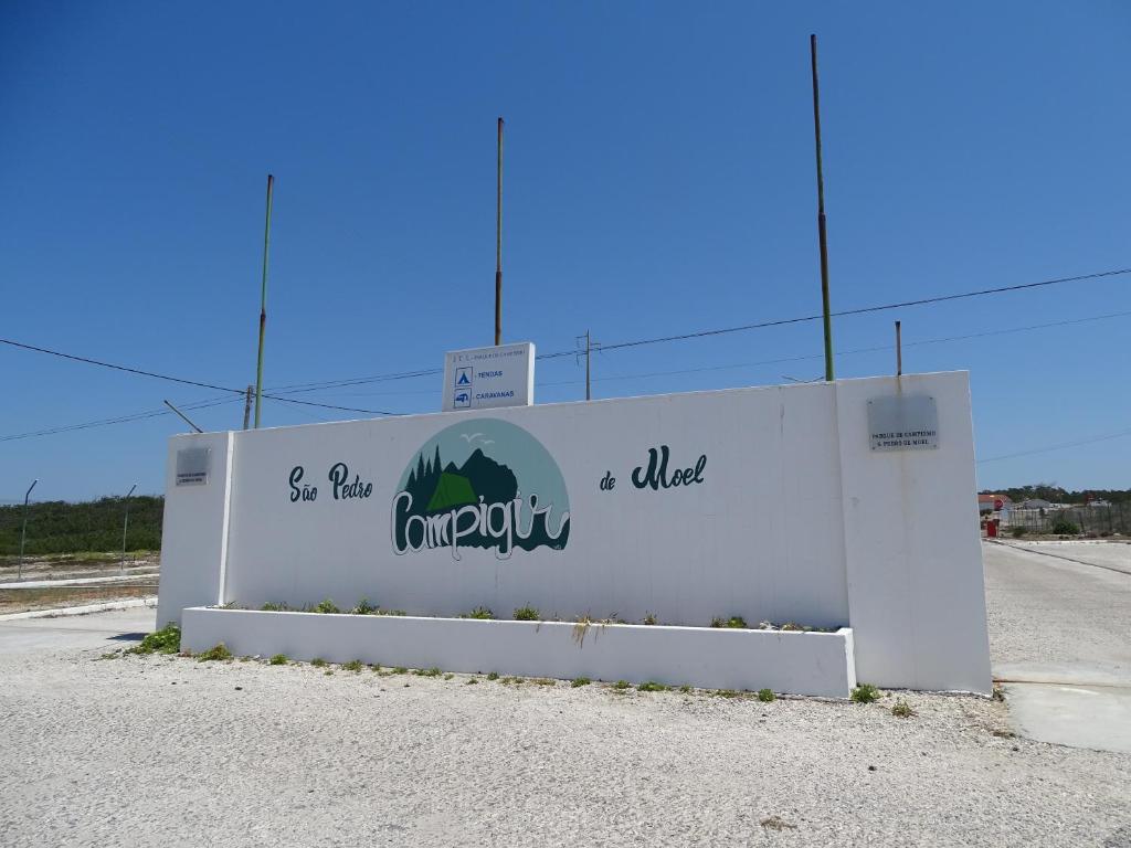 a sign on the side of a road at São Pedro de Moel by Campigir in São Pedro de Moel