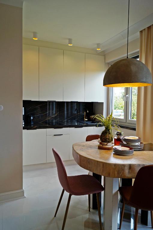 Kuchyňa alebo kuchynka v ubytovaní Apartament Pisz Centrum 7