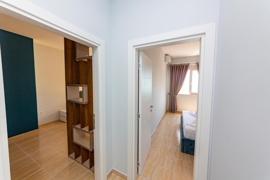Postel nebo postele na pokoji v ubytování Ponari S Hotel