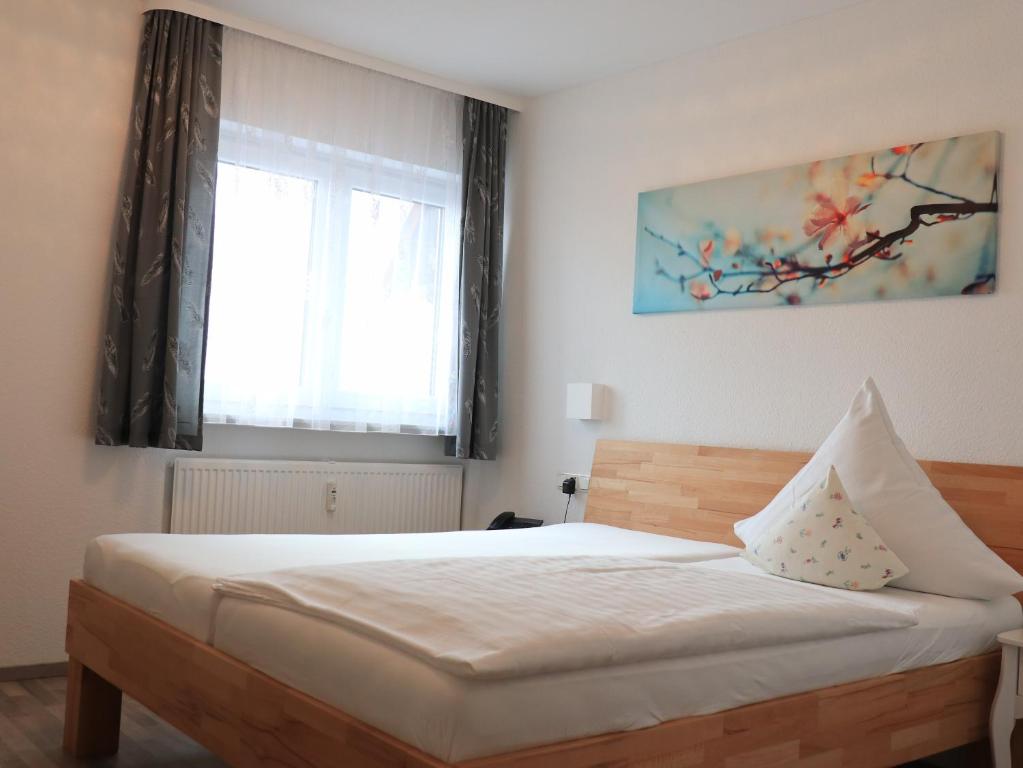 Postel nebo postele na pokoji v ubytování Hotel Princess