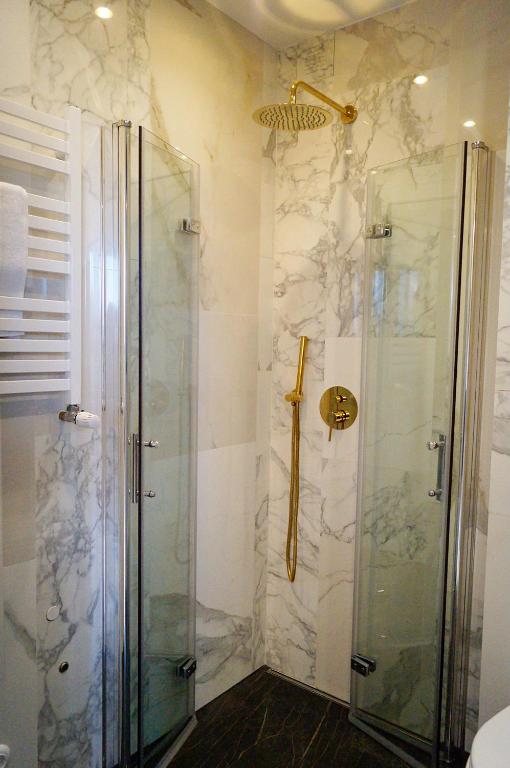 Kúpeľňa v ubytovaní Apartament Pisz Centrum 7