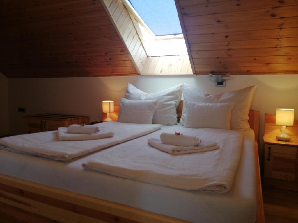 Postel nebo postele na pokoji v ubytování Casa Ninfea Panzió