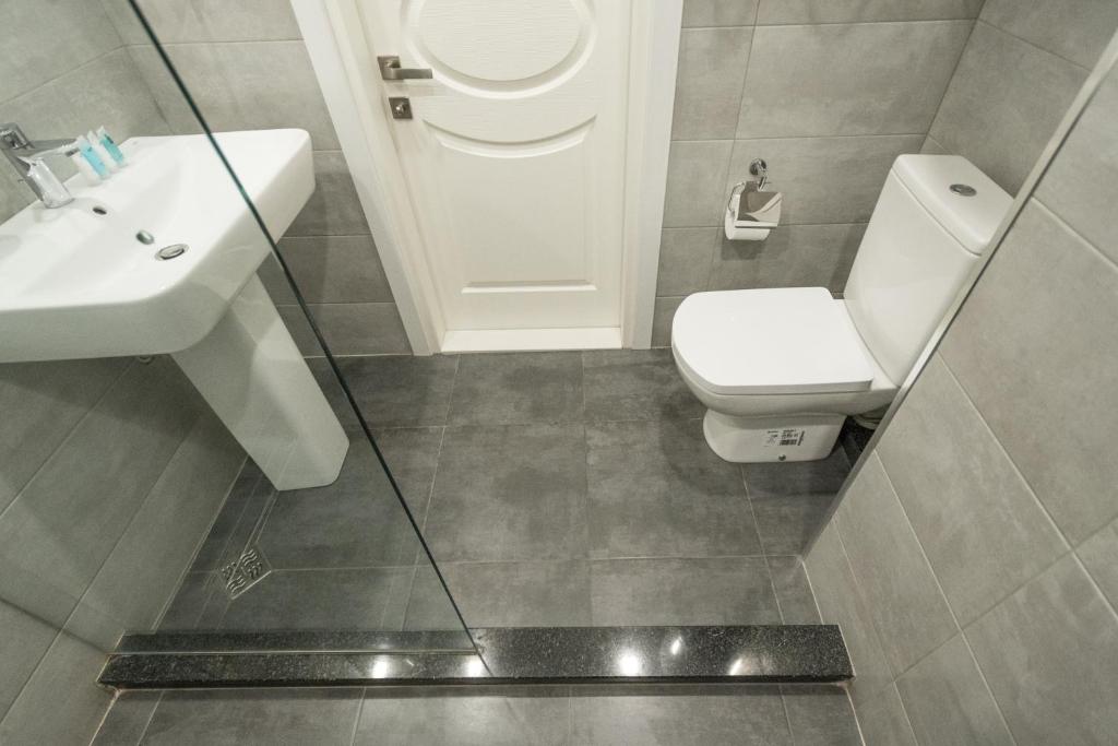 Koupelna v ubytování Orbi Residence Hotel Official
