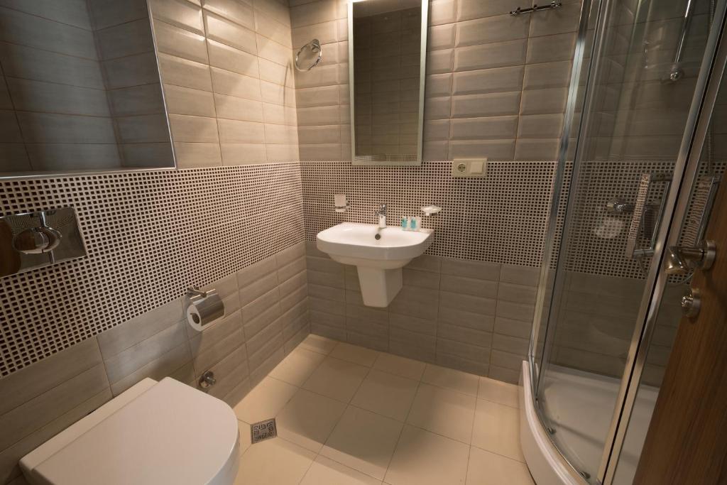 Koupelna v ubytování Orbi Residence Hotel Official