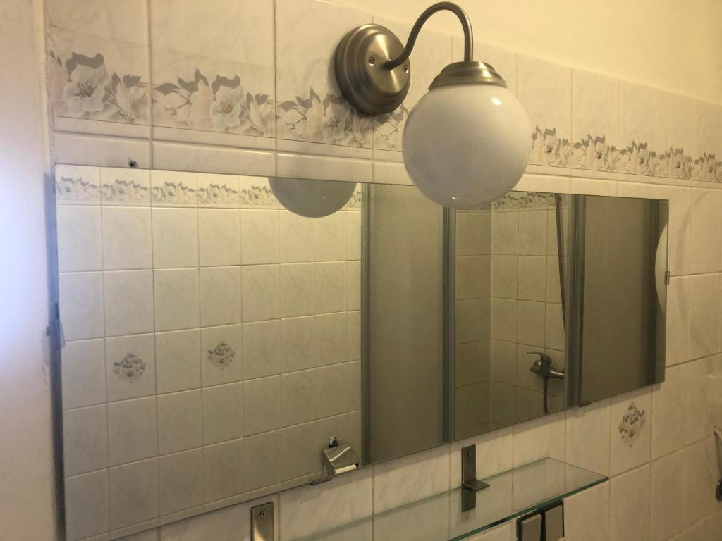 Koupelna v ubytování Apartmány Rossini