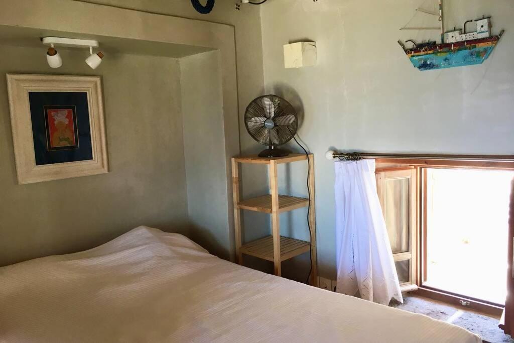 Posteľ alebo postele v izbe v ubytovaní Poseidon House