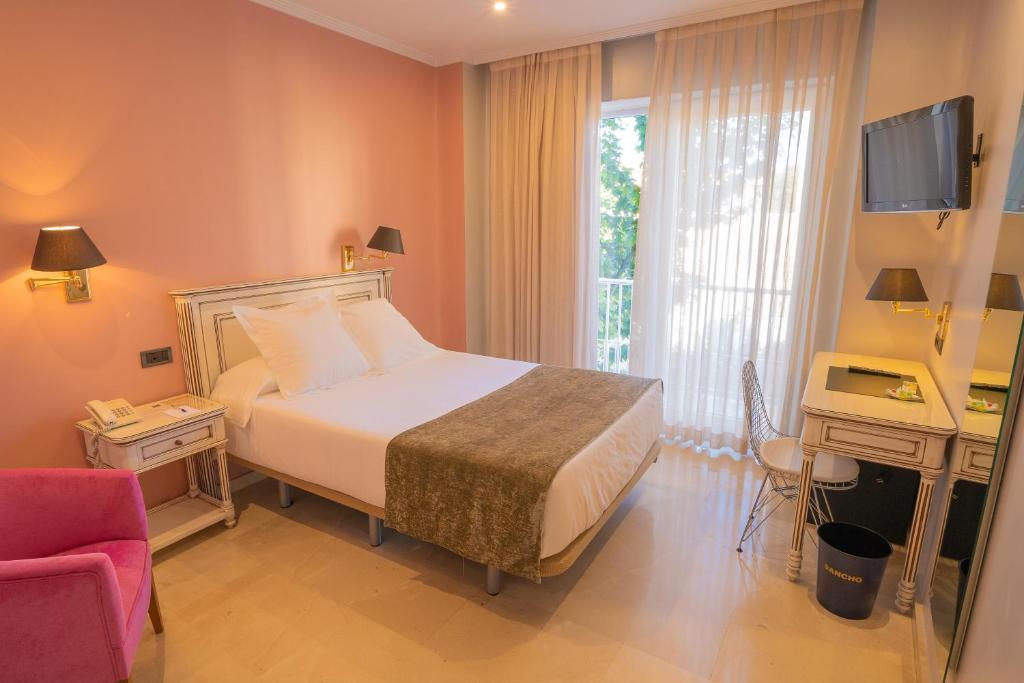 TV a/nebo společenská místnost v ubytování Hotel Sancho