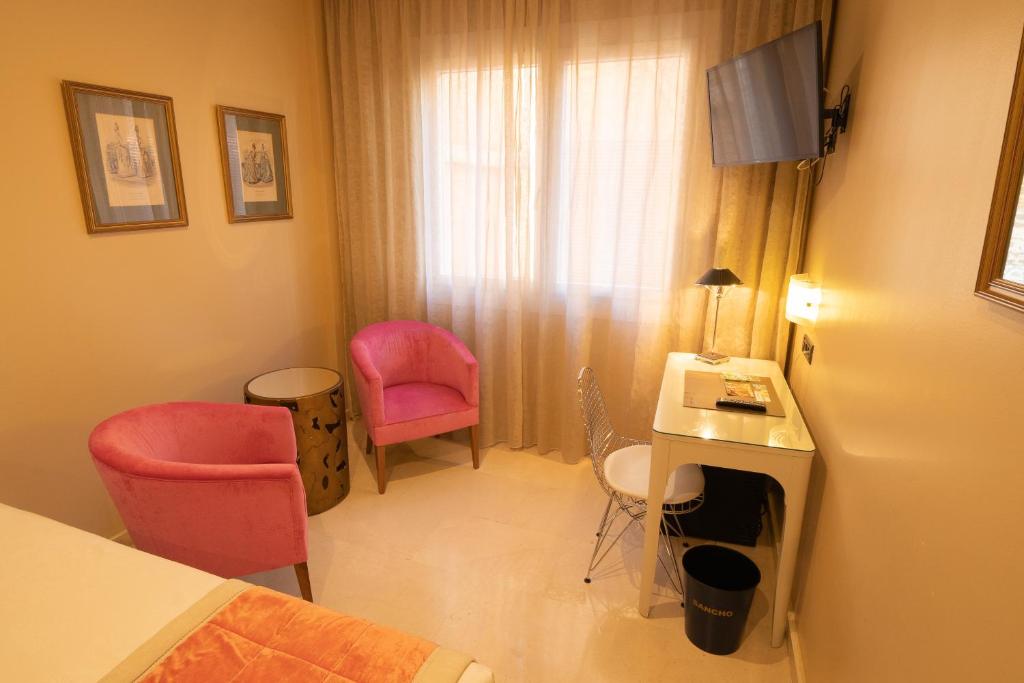 TV a/nebo společenská místnost v ubytování Hotel Sancho