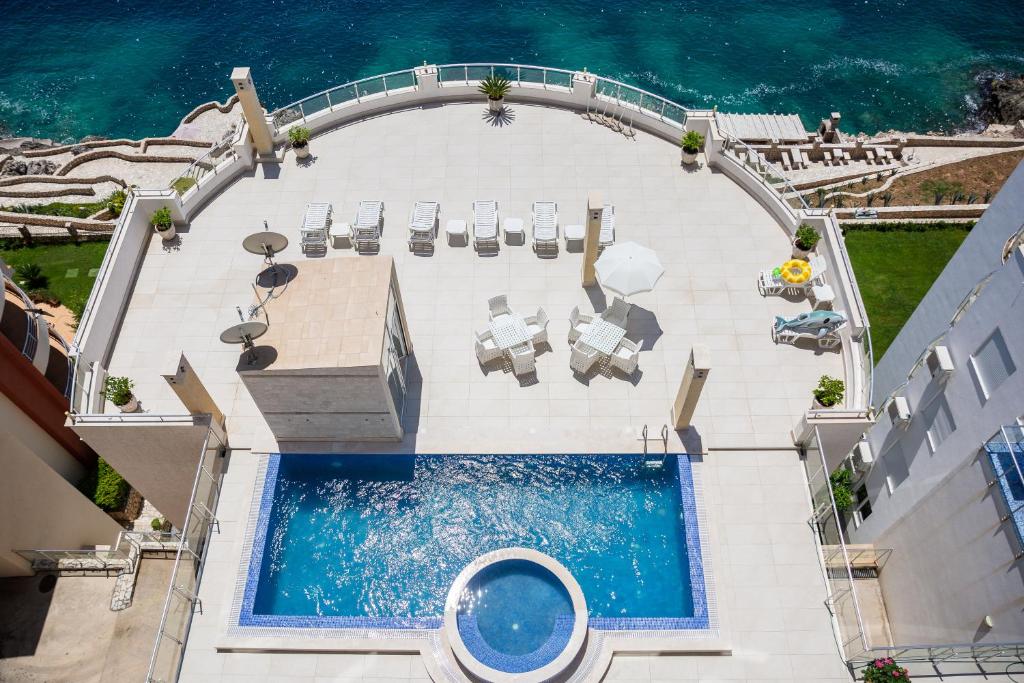 an overhead view of a swimming pool on a resort at Sky Fort Apartments in Dobra Voda