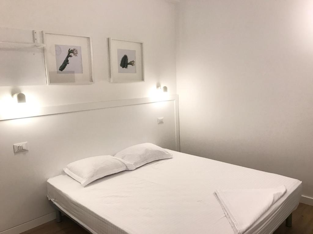 Postel nebo postele na pokoji v ubytování Aleksi rooms
