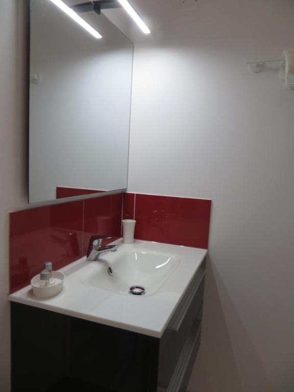Koupelna v ubytování Les Studios-Hôtel de Sommières