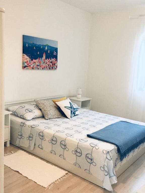 Postel nebo postele na pokoji v ubytování Holiday Home Casa Bianca