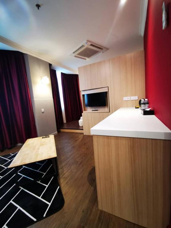 TV a/nebo společenská místnost v ubytování Regalodge Hotel & Spa Ipoh
