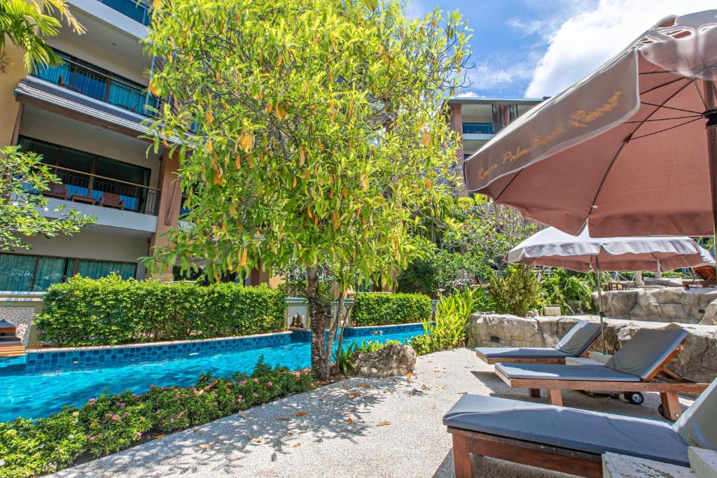 Der Swimmingpool an oder in der Nähe von Rawai Palm Beach Resort - SHA Extra Plus