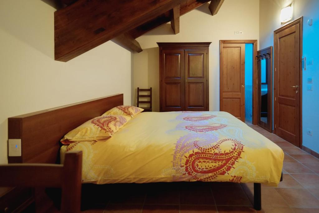 Posteľ alebo postele v izbe v ubytovaní Agriturismo Altana Del Motto Rosso
