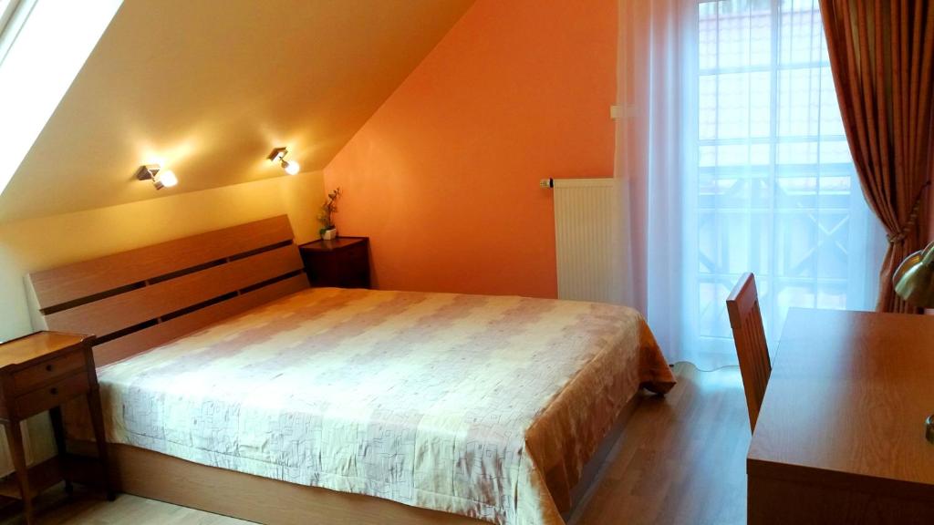 Postel nebo postele na pokoji v ubytování Vila Liepa