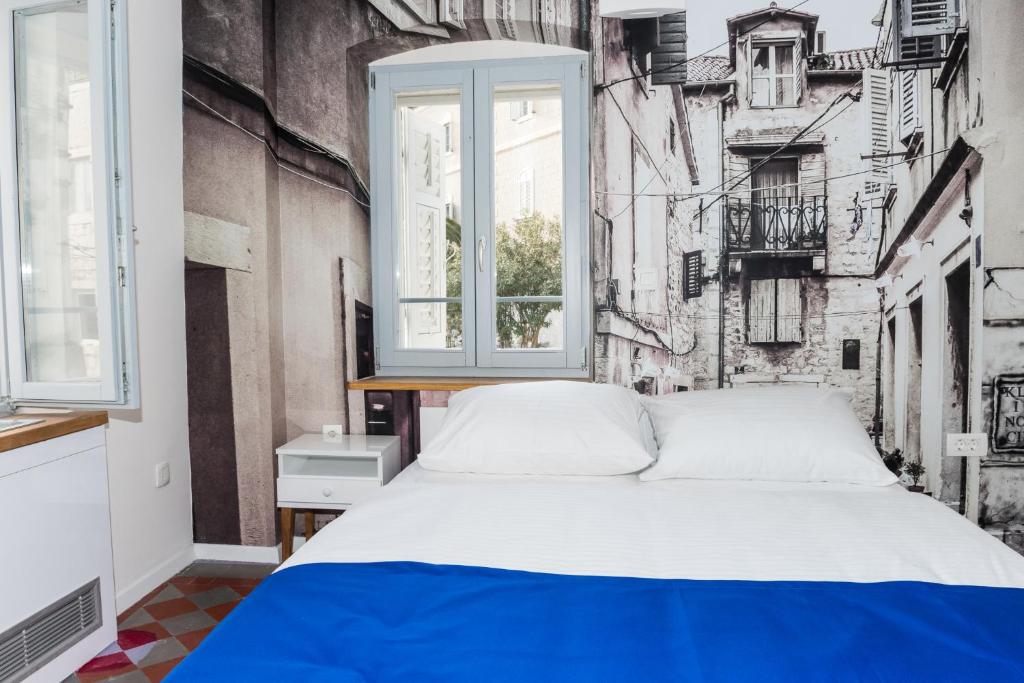 Posteľ alebo postele v izbe v ubytovaní Villa Galla