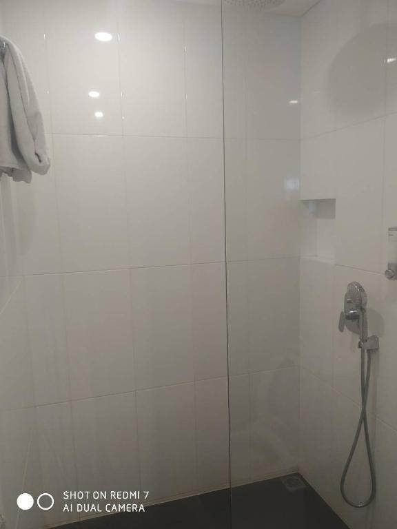 Koupelna v ubytování Grand G7 Hotel Kemayoran