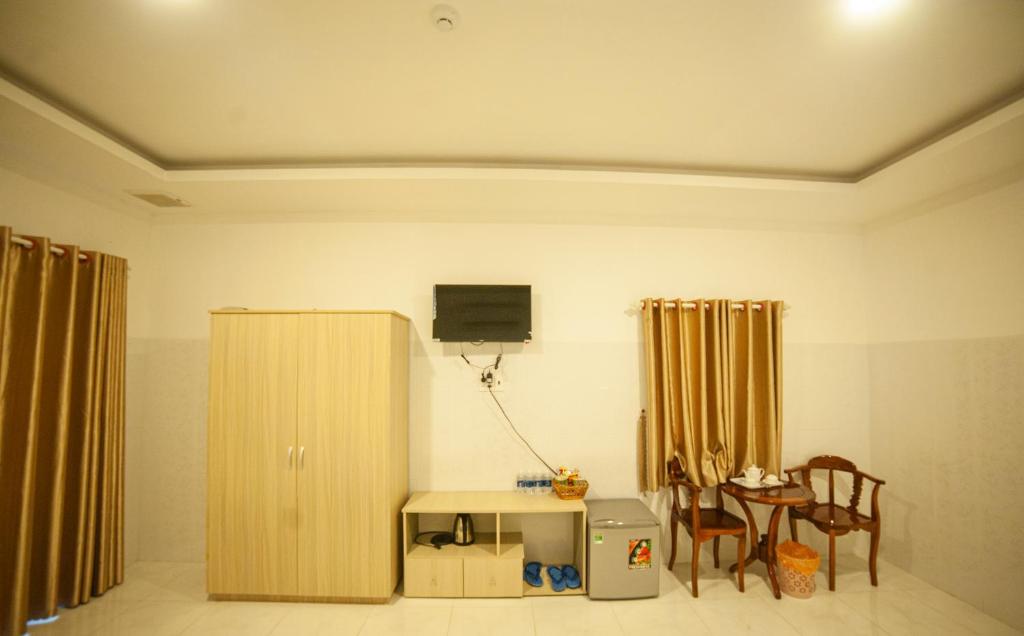 TV a/nebo společenská místnost v ubytování FaMi Nguyễn Homestay Châu Đốc