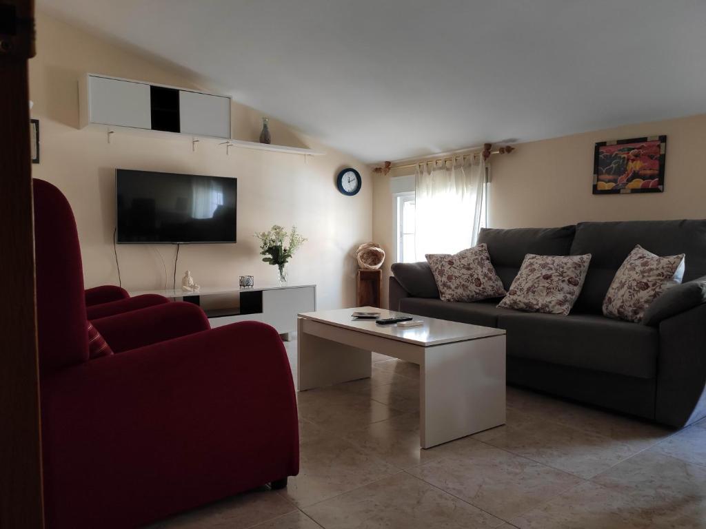Posezení v ubytování Apartamentos La Relojera 2