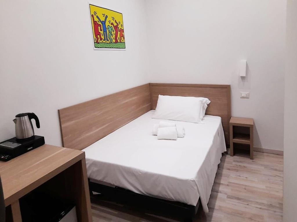 Postel nebo postele na pokoji v ubytování A&B Affittacamere a Boccadasse