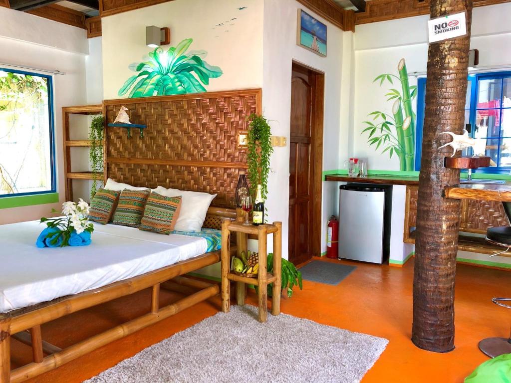 Postel nebo postele na pokoji v ubytování Apo Diver Beach Resort