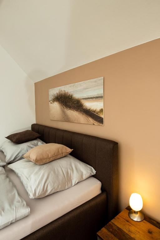 Postel nebo postele na pokoji v ubytování L&P Appartement Klagenfurt
